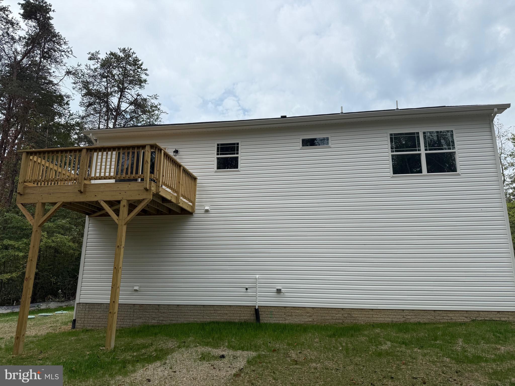 3153 Lewiston Road Bumpass, VA 23024 - Photo 43 of 45 a view of a house with a yard