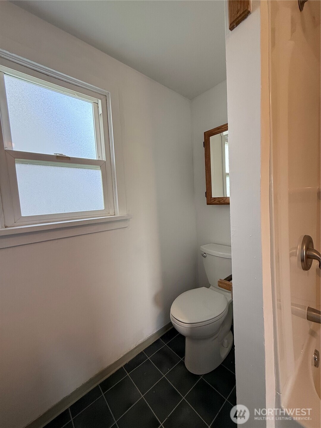 306 South Adams Street Waterville, WA 98858 - Photo 14 of 25 a bathroom with a toilet