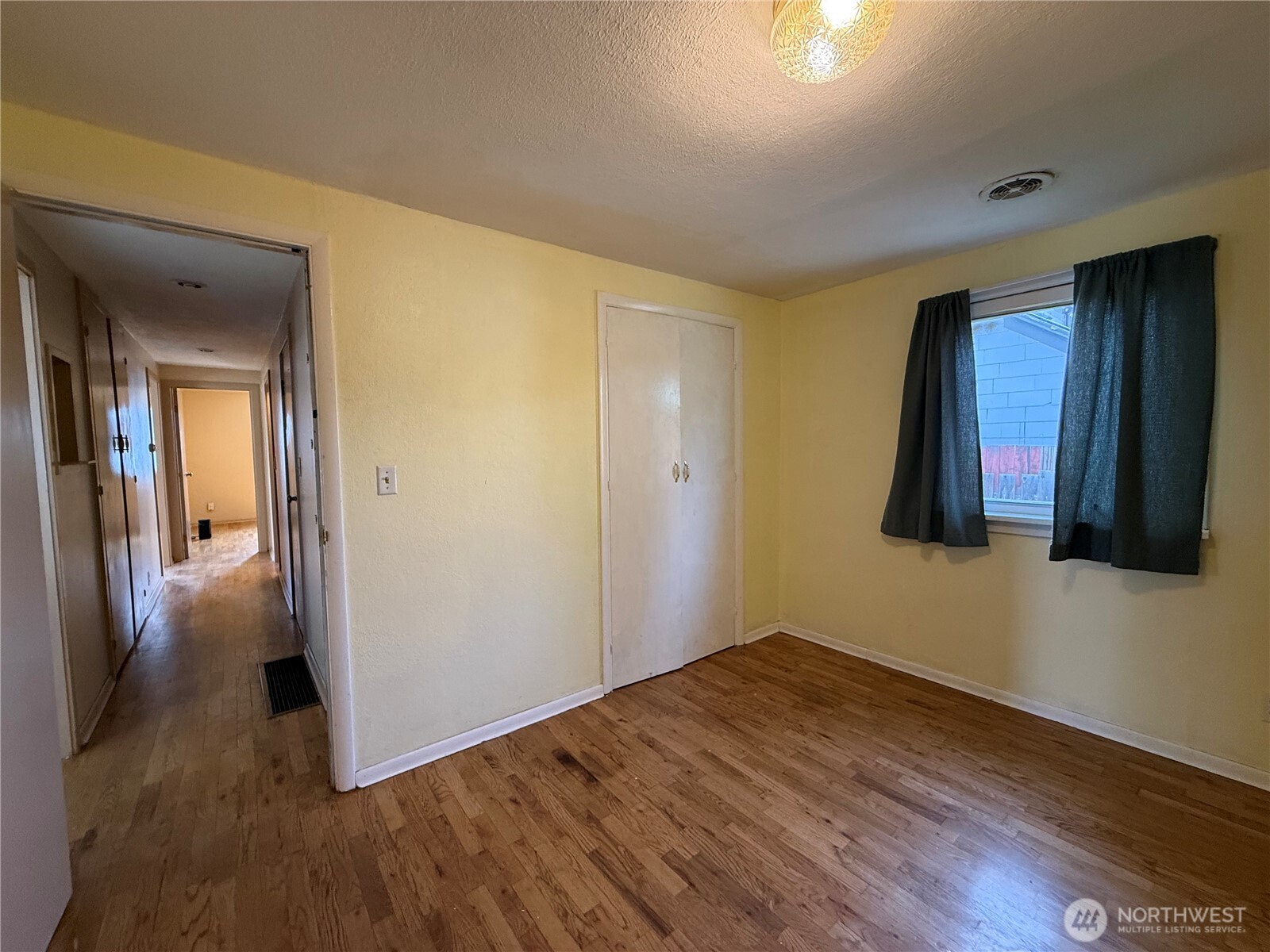 306 South Adams Street Waterville, WA 98858 - Photo 17 of 25 a view of a room with wooden floor and cabinet