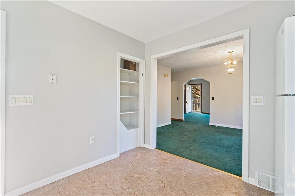 223 Oak Road Pittsburgh, PA 15239 - Photo 11 of 25 a view of a bedroom from window