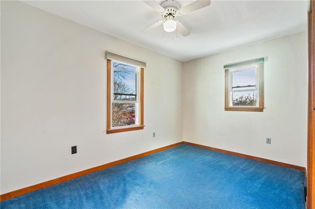223 Oak Road Pittsburgh, PA 15239 - Photo 16 of 25 a view of an empty room with a window