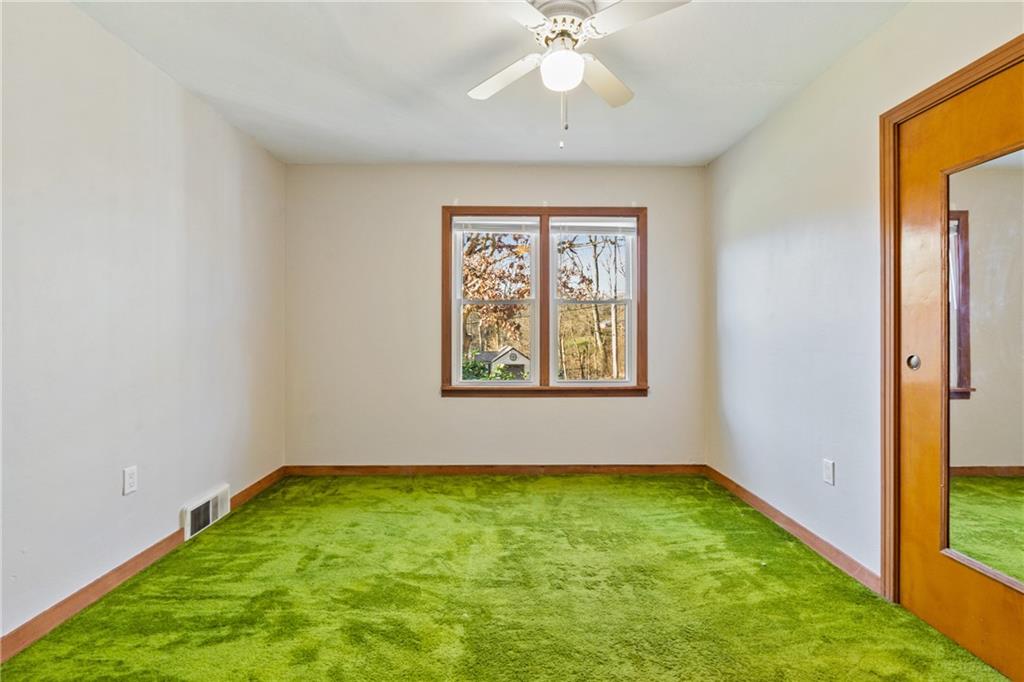 223 Oak Road Pittsburgh, PA 15239 - Photo 18 of 25 a view of room with window and ceiling fan