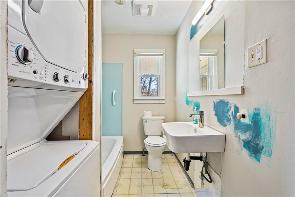223 Oak Road Pittsburgh, PA 15239 - Photo 20 of 25 a bathroom with a sink a toilet and a mirror
