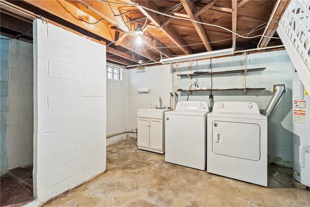 223 Oak Road Pittsburgh, PA 15239 - Photo 21 of 25 a utility room with dryer and washer