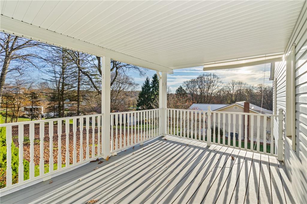 223 Oak Road Pittsburgh, PA 15239 - Photo 22 of 25 a view of balcony with wooden floor