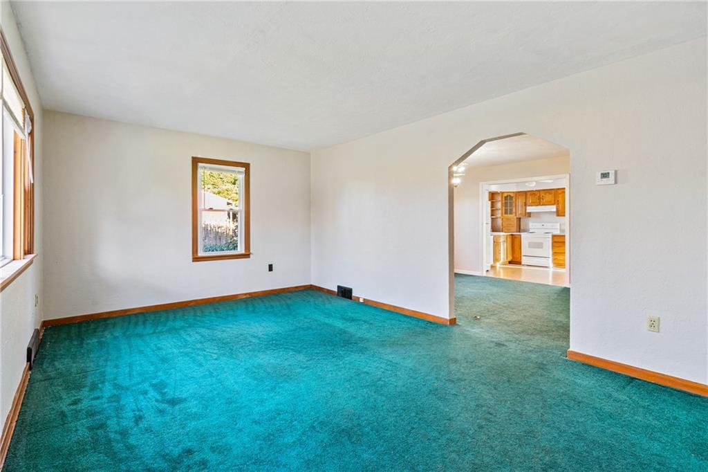 223 Oak Road Pittsburgh, PA 15239 - Photo 3 of 25 an empty room with window