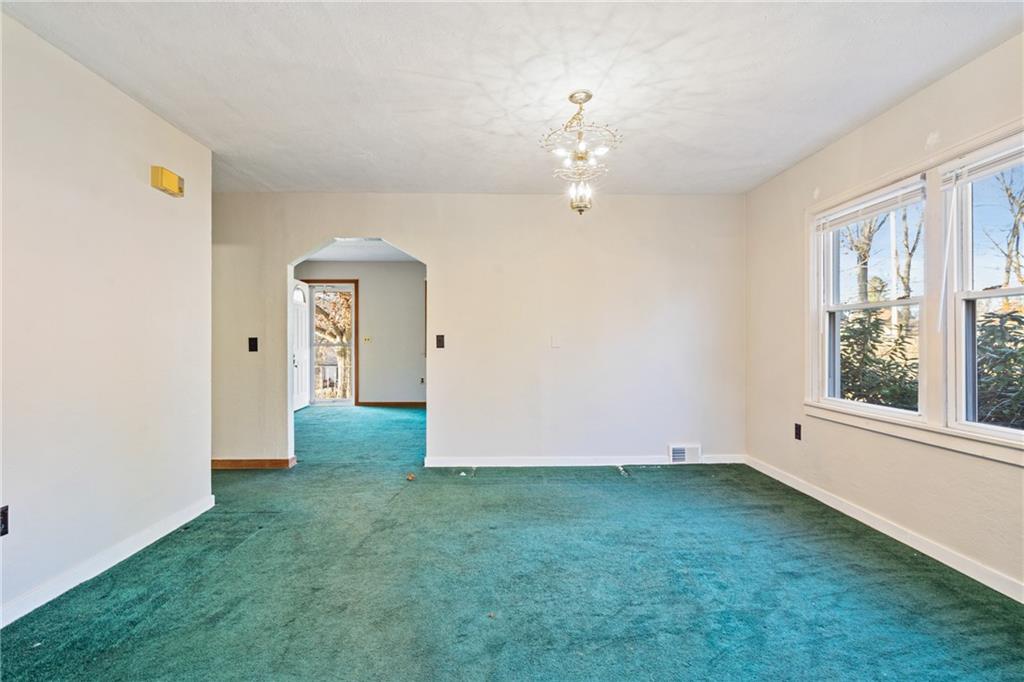 223 Oak Road Pittsburgh, PA 15239 - Photo 5 of 25 an empty room with window
