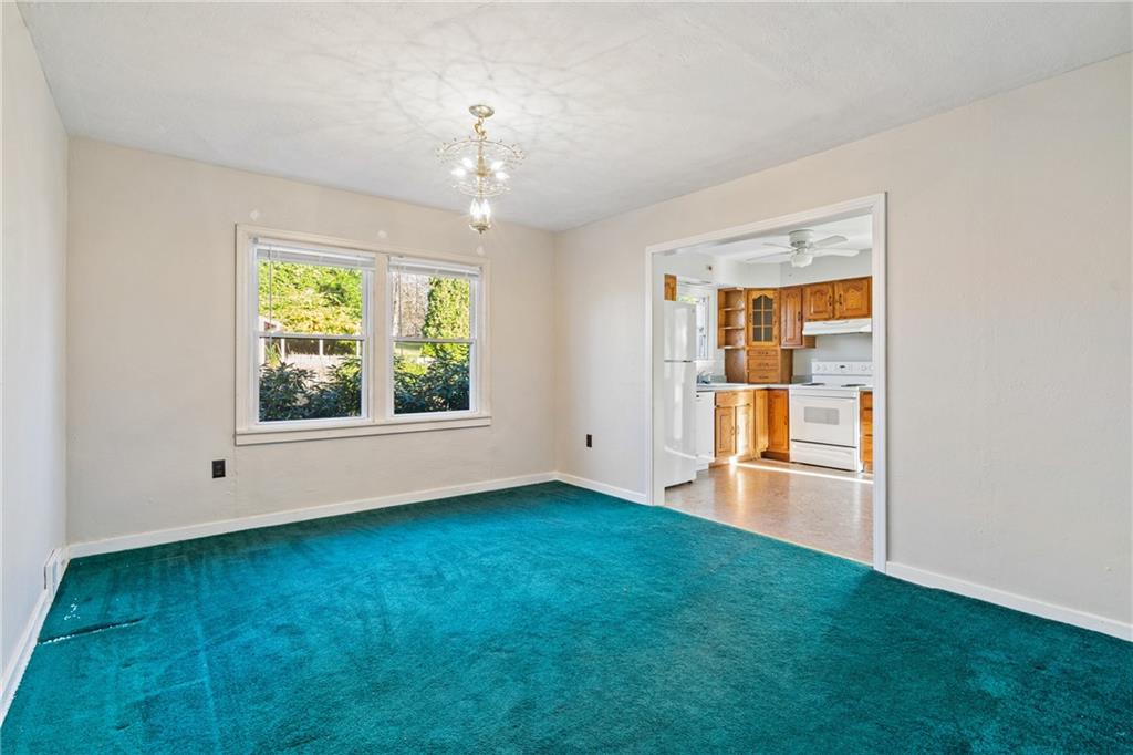 223 Oak Road Pittsburgh, PA 15239 - Photo 6 of 25 an empty room with windows