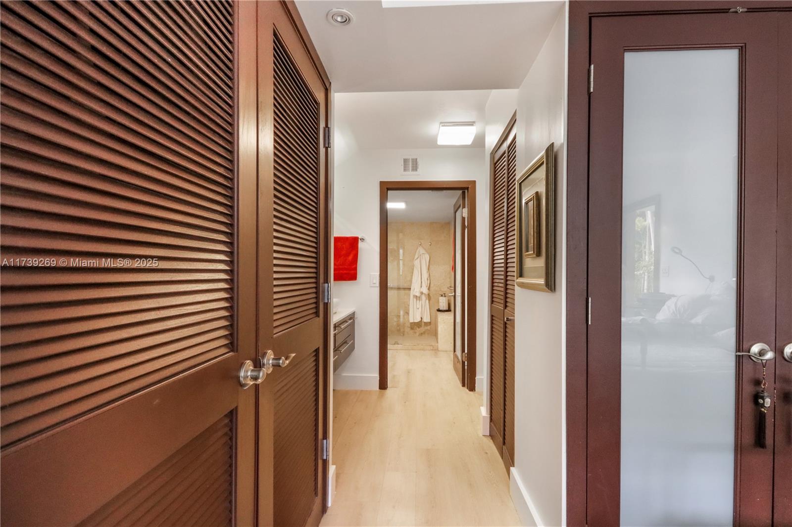 101 Ocean Ln Drive, Unit 1017 Key Biscayne, FL 33149 - Photo 11 of 25 a view of a hallway with a hallway