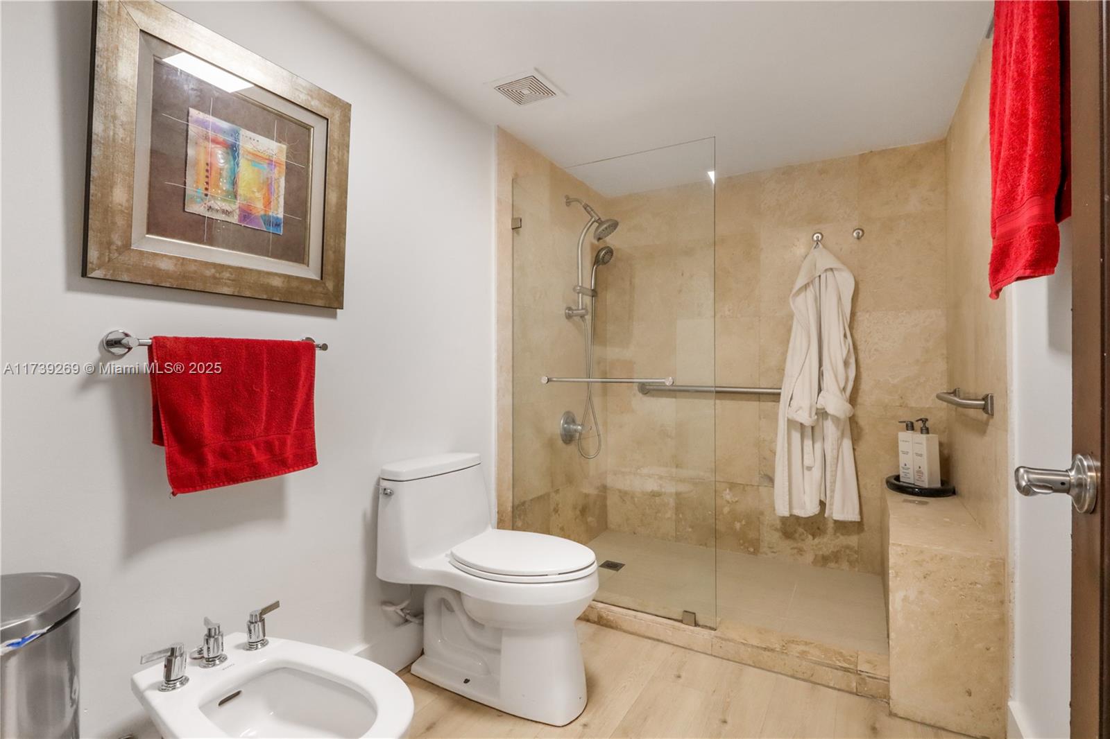 101 Ocean Ln Drive, Unit 1017 Key Biscayne, FL 33149 - Photo 13 of 25 a bathroom with a toilet sink and shower