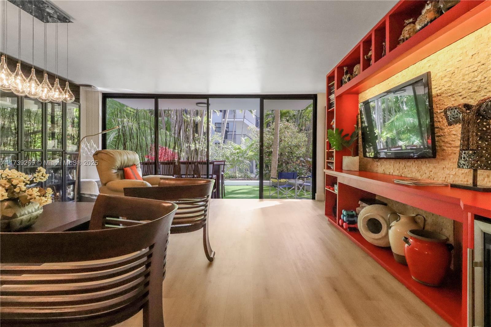 101 Ocean Ln Drive, Unit 1017 Key Biscayne, FL 33149 - Photo 4 of 25 a living room with furniture and a floor to ceiling window