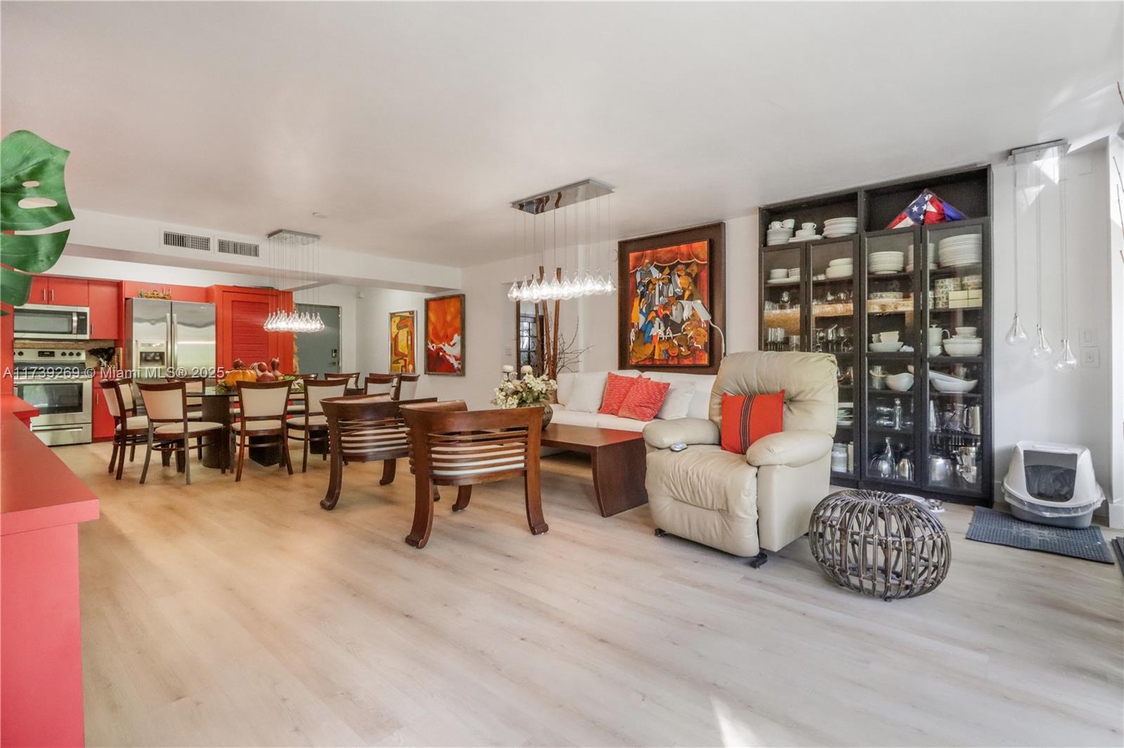 101 Ocean Ln Drive, Unit 1017 Key Biscayne, FL 33149 - Photo 5 of 25 a living room with furniture and a gym equipment