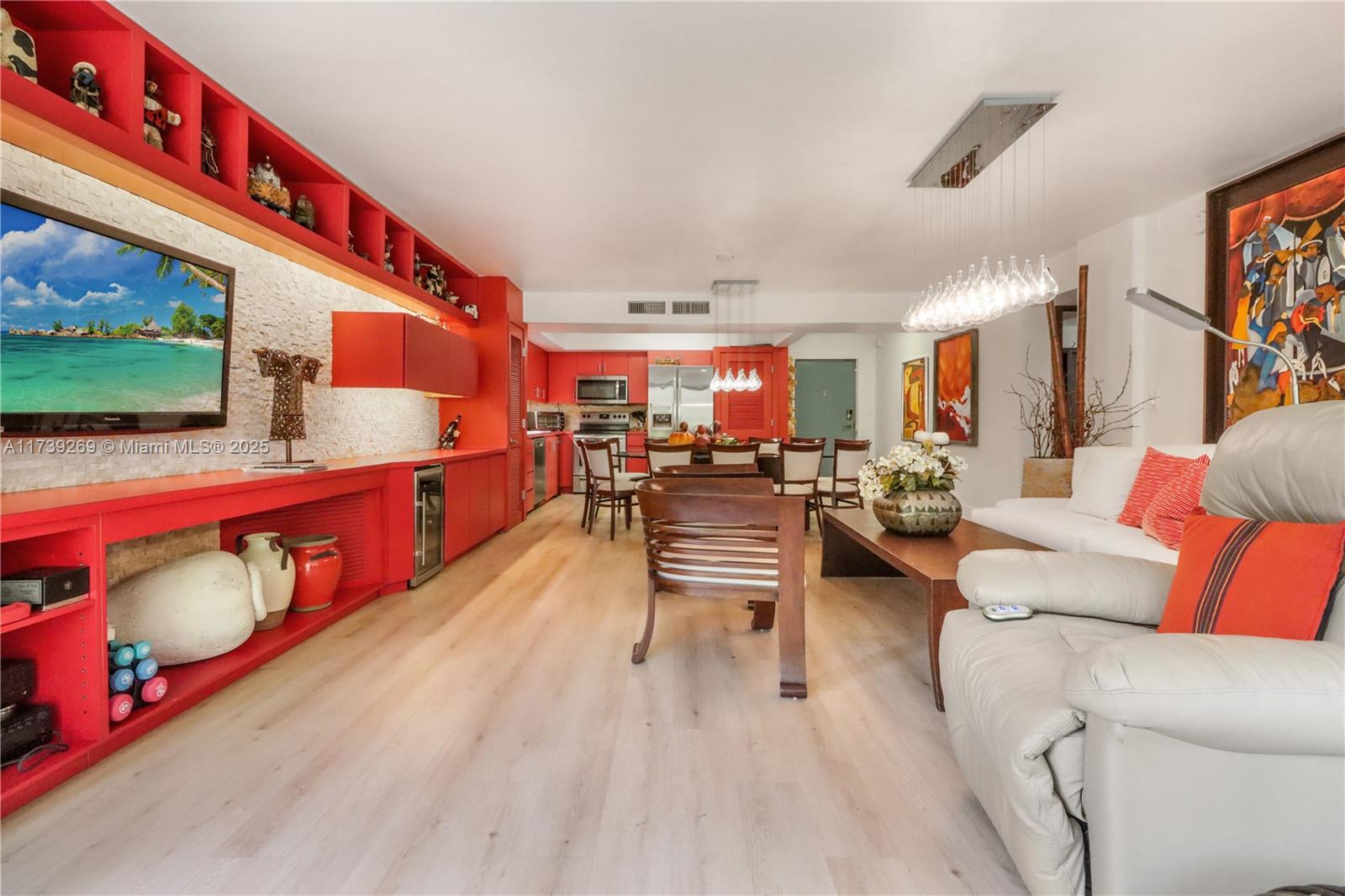 101 Ocean Ln Drive, Unit 1017 Key Biscayne, FL 33149 - Photo 6 of 25 a living room with furniture kitchen view and a flat screen tv