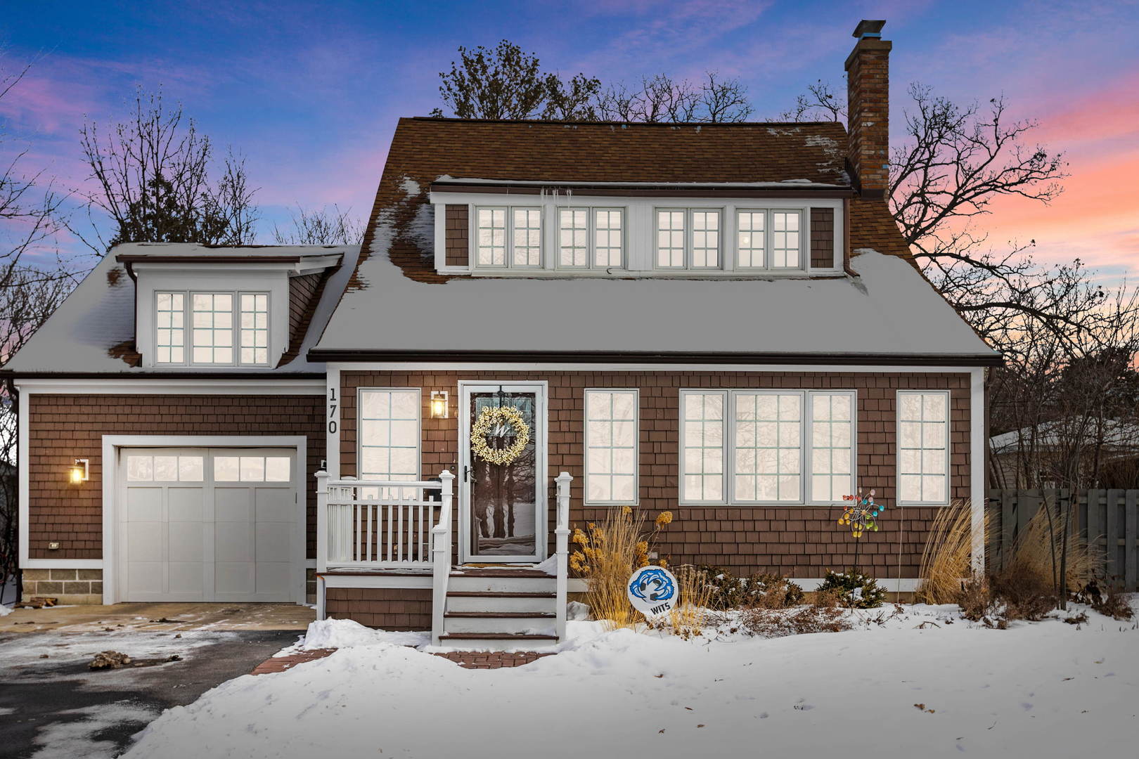 170 North Old Rand Road Lake Zurich, IL 60047 - Photo 1 of 34 a front view of a house with a outdoor space