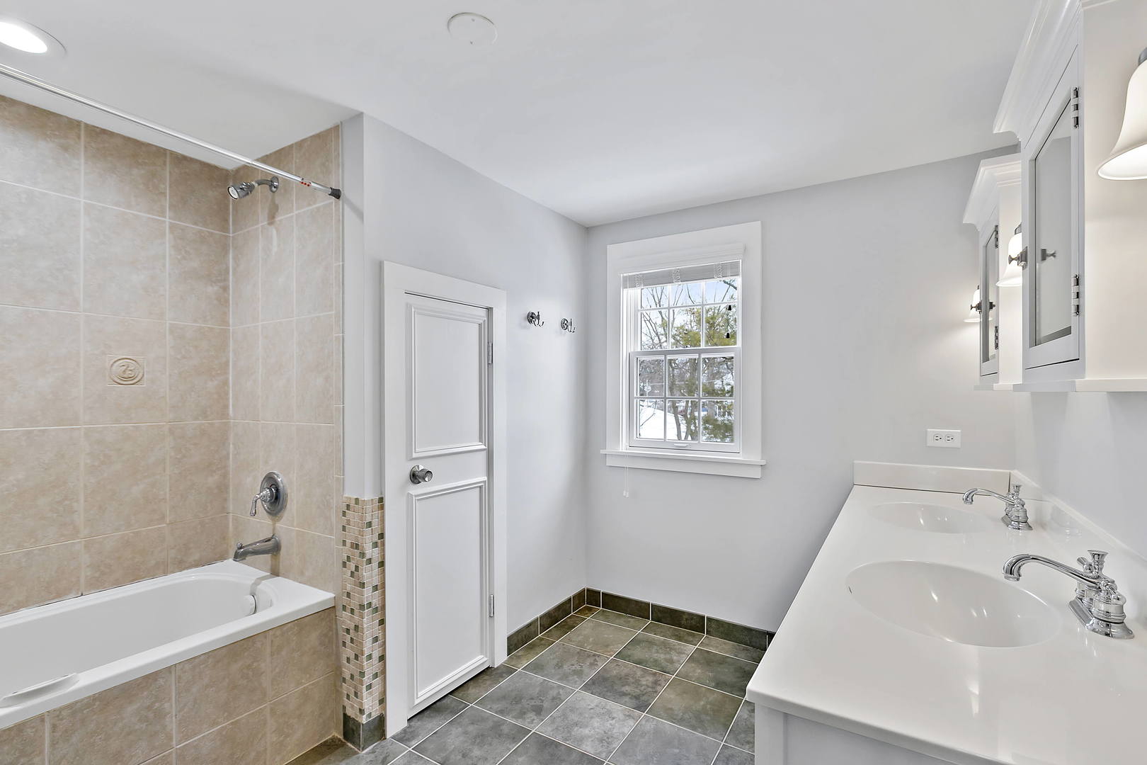 170 North Old Rand Road Lake Zurich, IL 60047 - Photo 23 of 34 a bathroom with a tub sink shower and a mirror