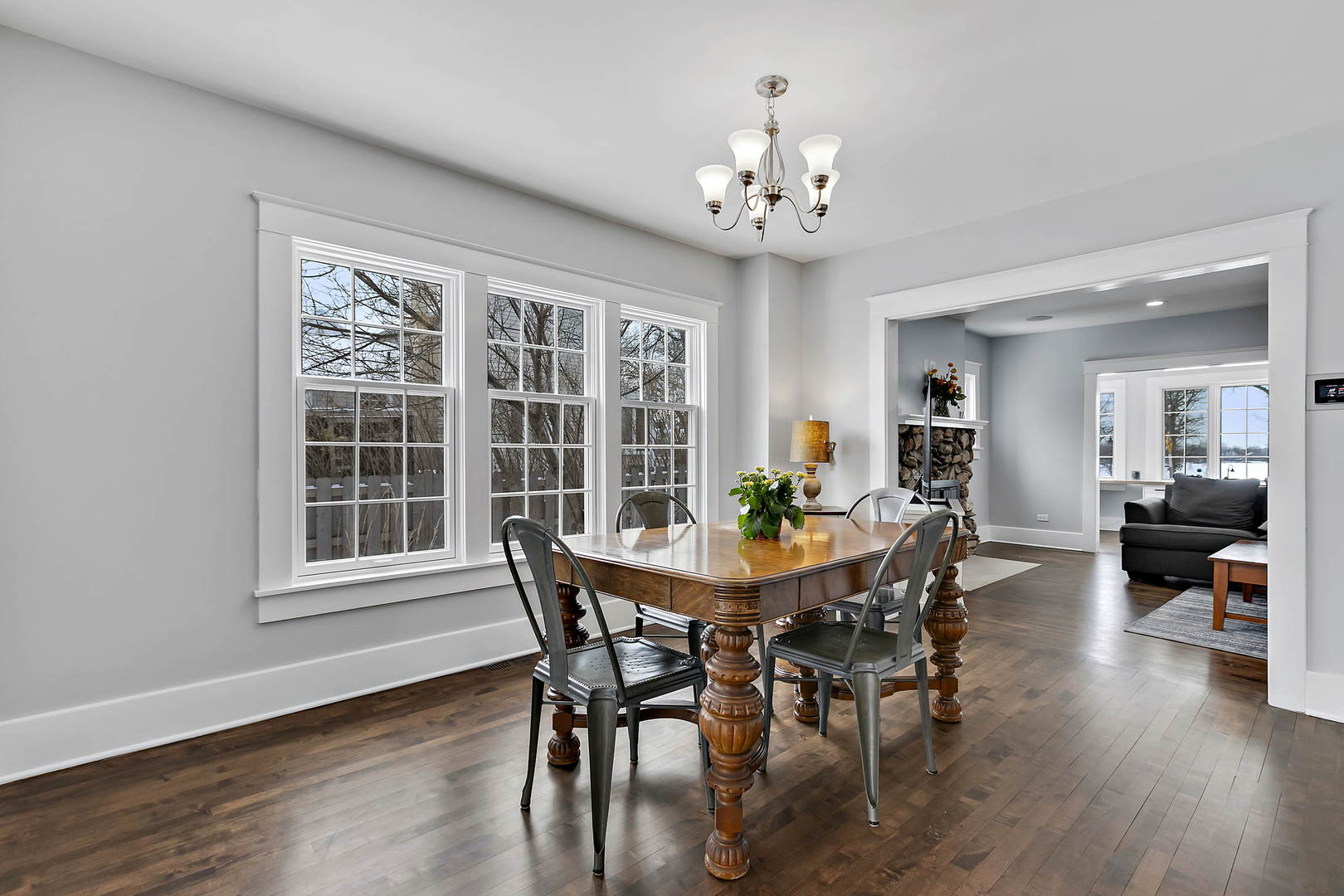 170 North Old Rand Road Lake Zurich, IL 60047 - Photo 9 of 34 a view of a dining room with furniture wooden floor and chandelier