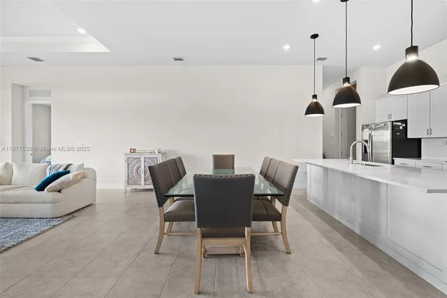 a view of a house with a garden