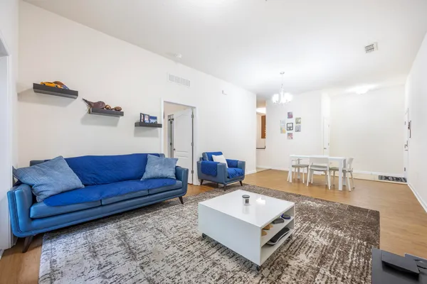a living room with furniture and a couch