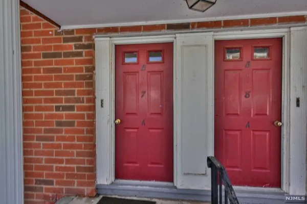 a view of a red door of the house