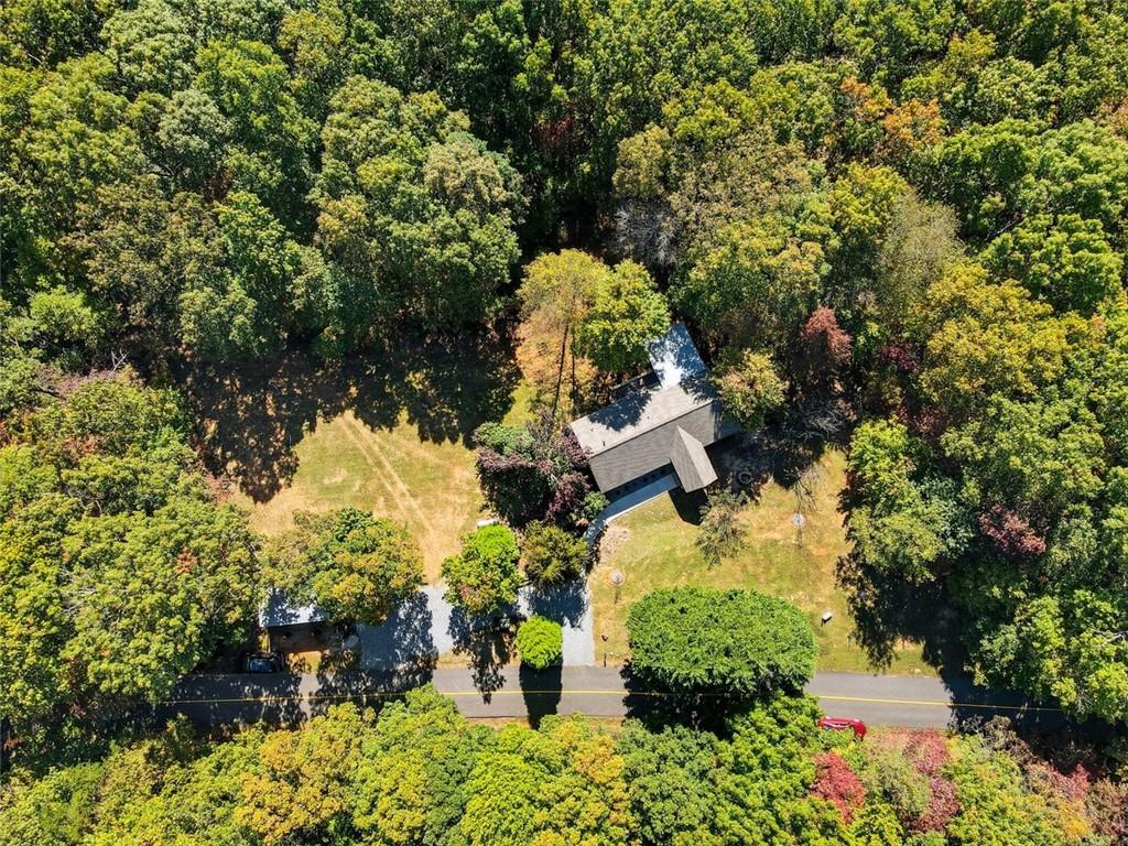 1512 Upper Sassafras Road Jasper, GA 30143 - Photo 10 of 41 an aerial view of a house with a yard