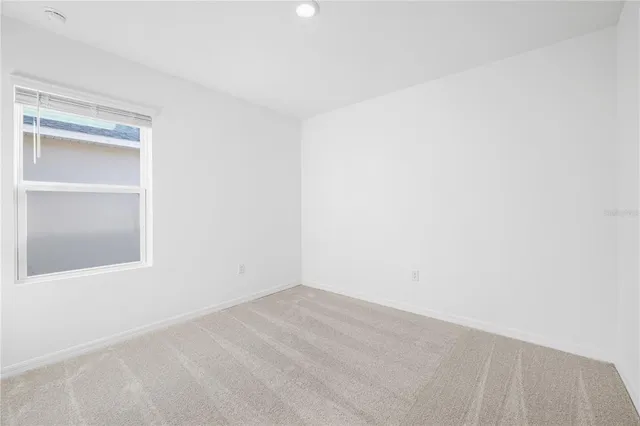 a view of an empty room with window