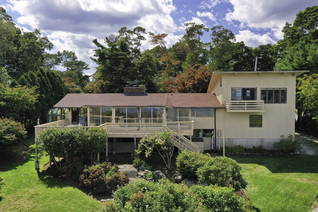 15 Arrowhead Lane Marion, MA 02738 - Photo 2 of 42 a front view of a house with garden