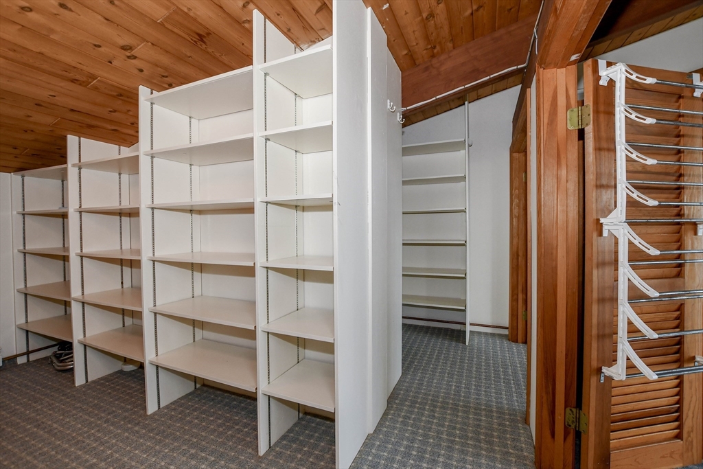 15 Arrowhead Lane Marion, MA 02738 - Photo 21 of 42 a view of walk in closet with empty racks