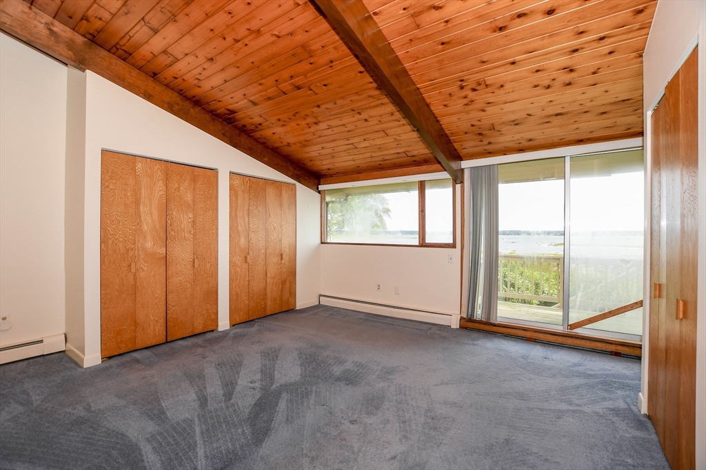 15 Arrowhead Lane Marion, MA 02738 - Photo 22 of 42 a view of an empty room with a window