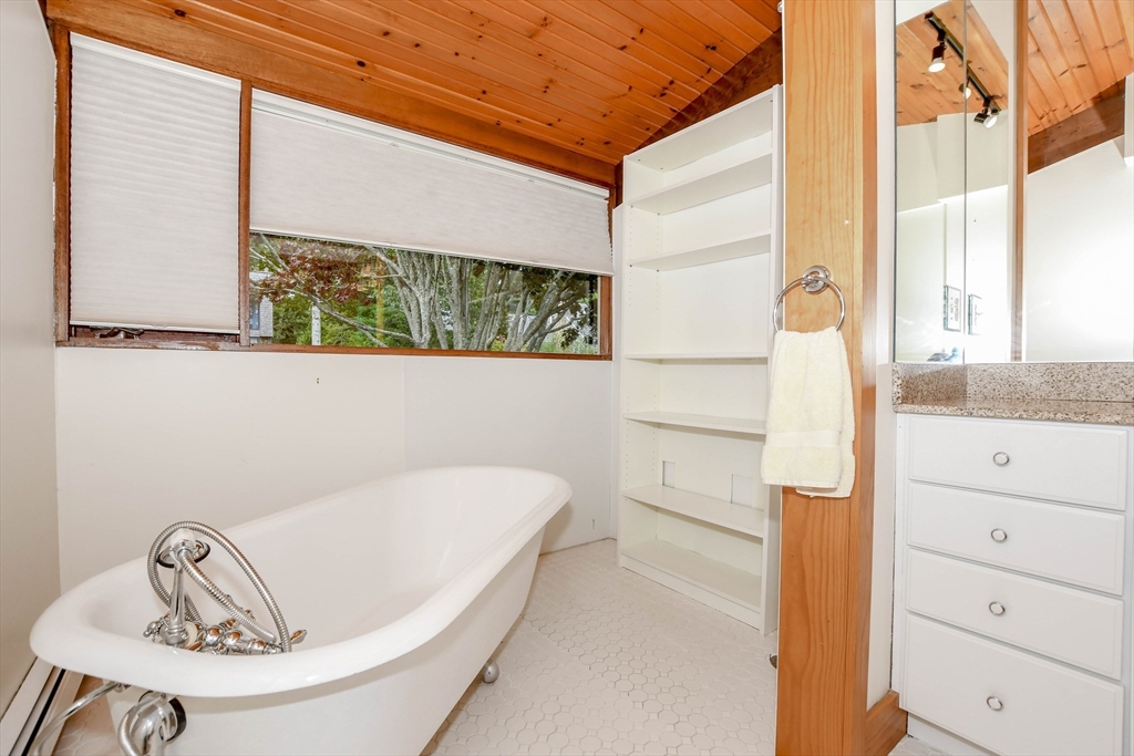 15 Arrowhead Lane Marion, MA 02738 - Photo 25 of 42 a bathroom with a sink and a window