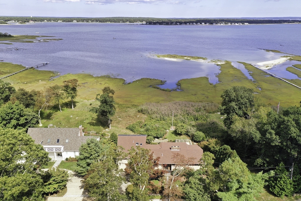 15 Arrowhead Lane Marion, MA 02738 - Photo 3 of 42 an aerial view of ocean with residential house and lake view