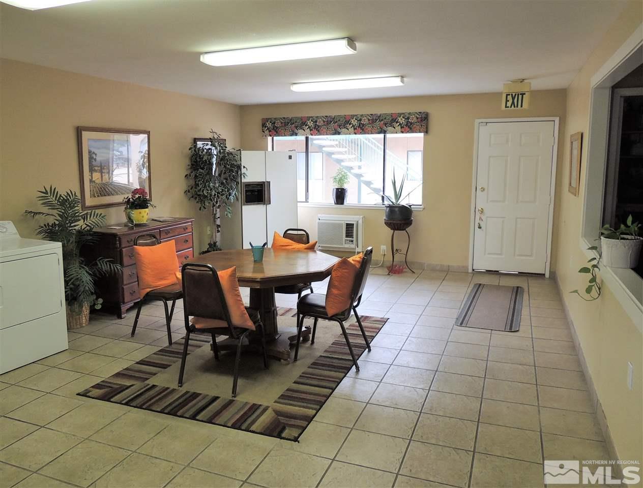197 East Grove Street, Unit E8 Reno, NV 89502 - Photo 8 of 10 a view of a dining room with furniture