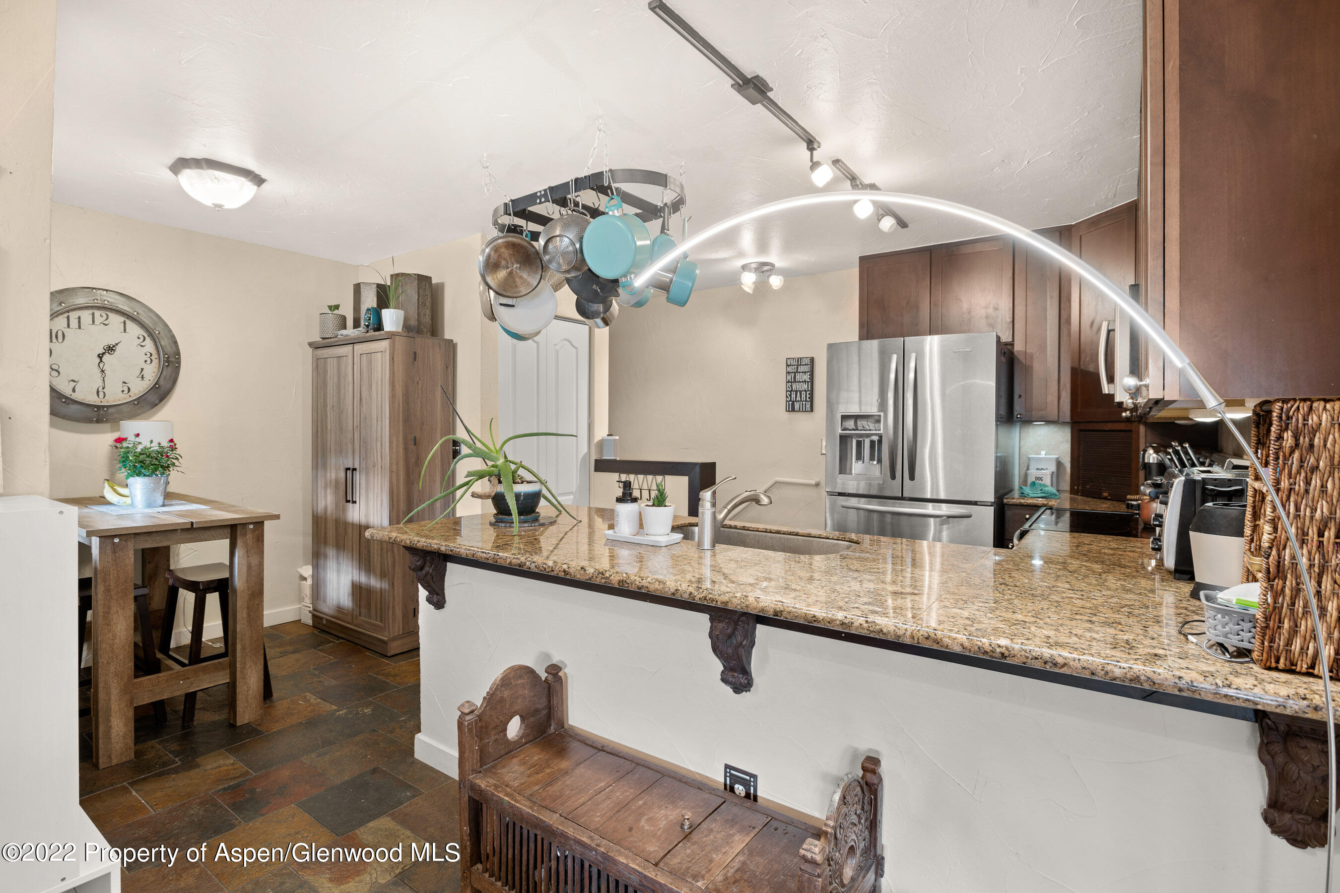7204 Elk Run Drive Basalt, CO 81621 - Photo 5 of 20 a kitchen with a sink a counter space and stainless steel appliances