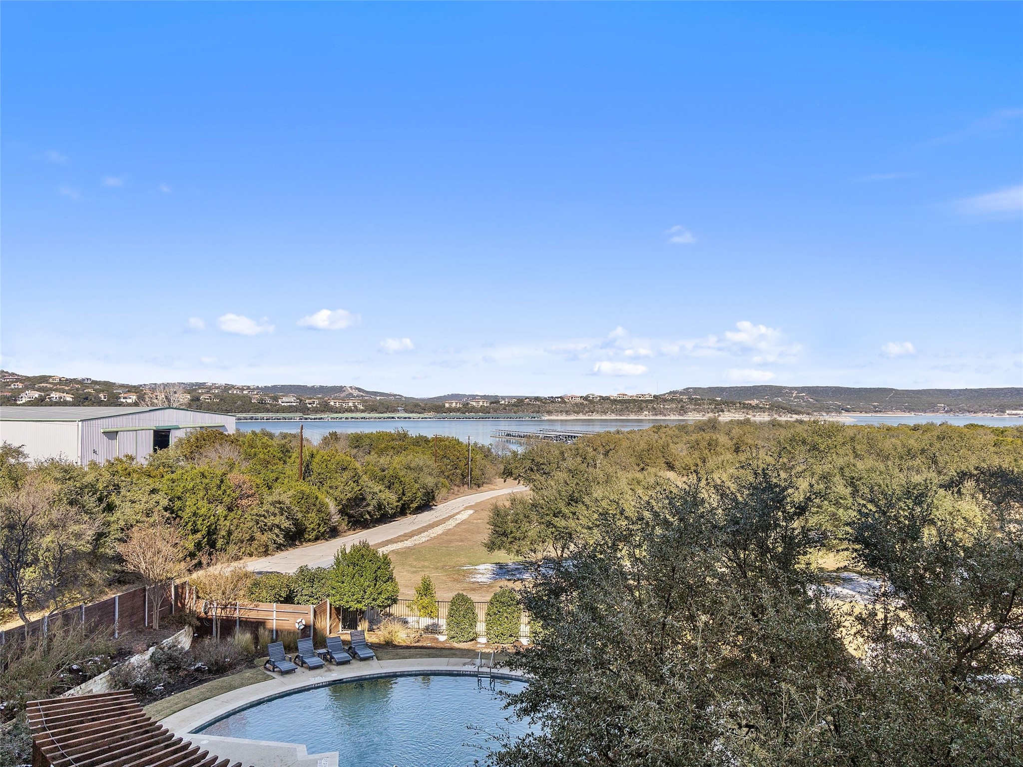 5921 Hiline Road, Unit 1303 Austin, TX 78734 - Photo 27 of 37 a view of a city and lake view