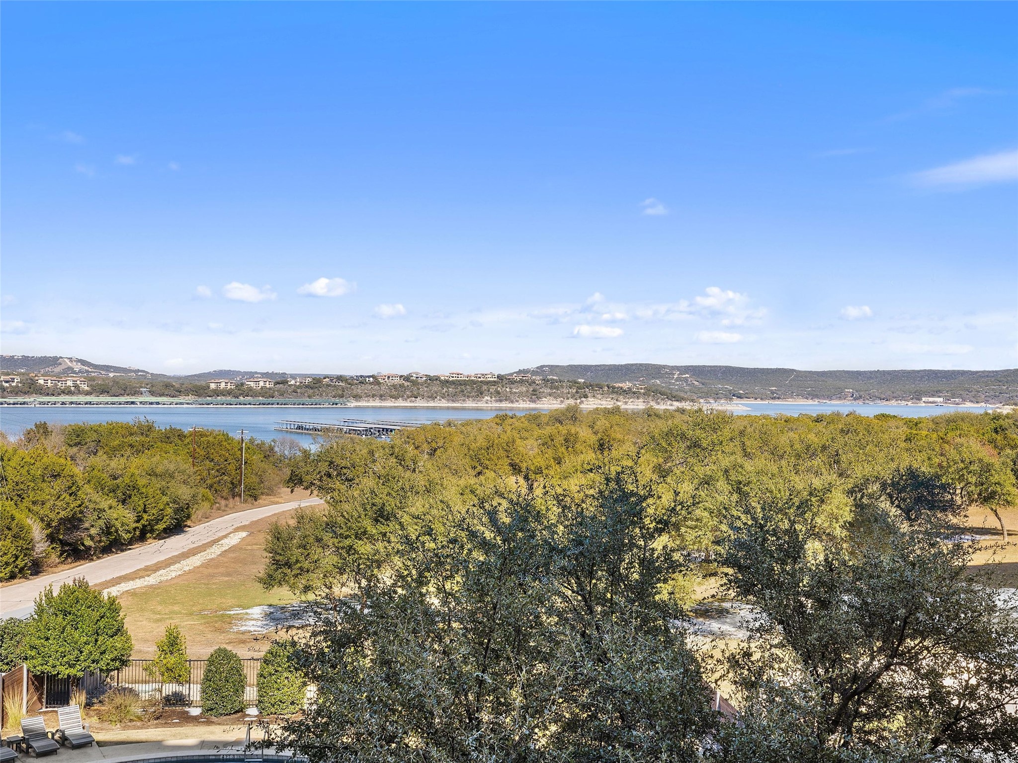 5921 Hiline Road, Unit 1303 Austin, TX 78734 - Photo 29 of 37 a view of an ocean and mountain