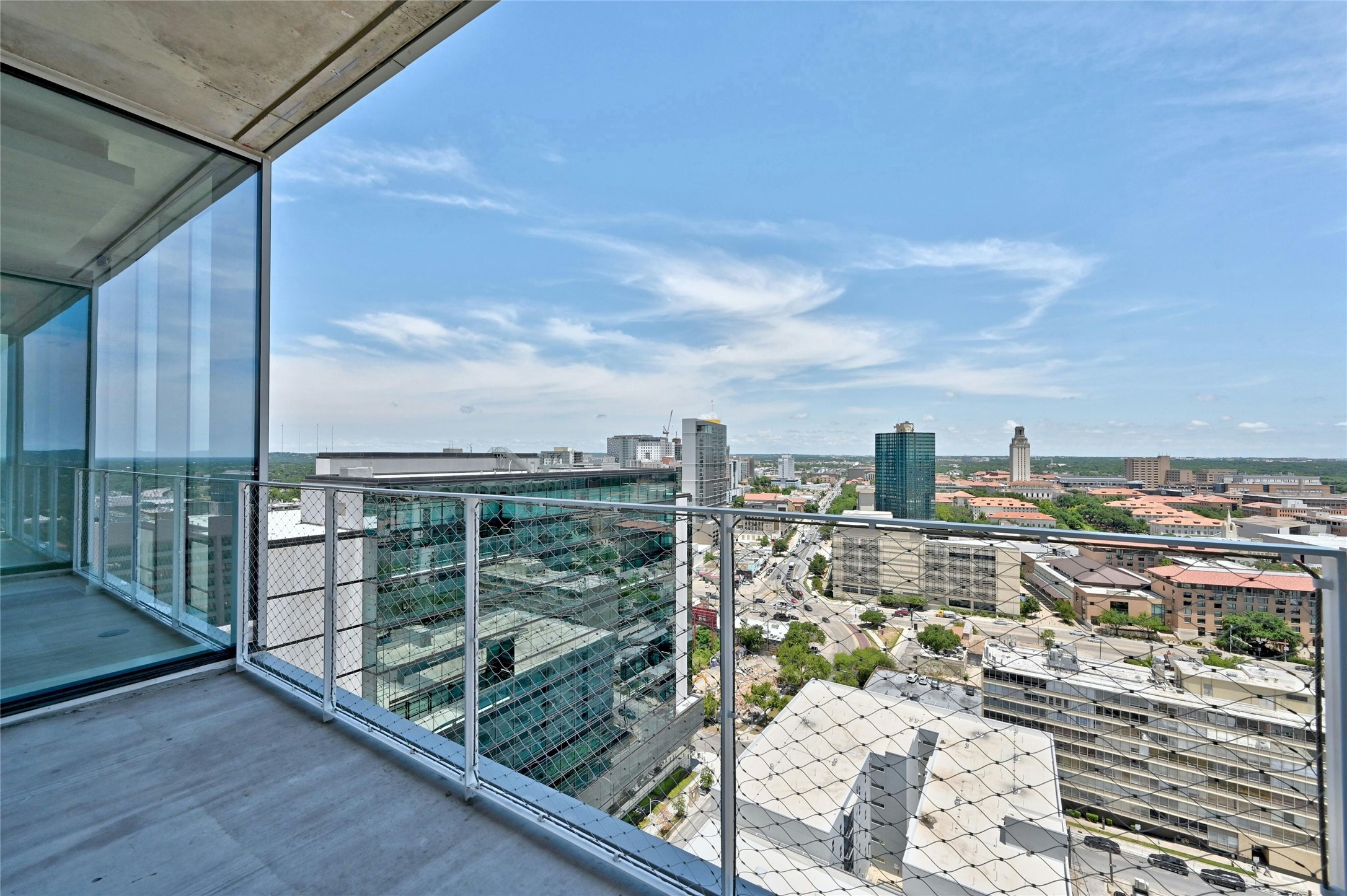 313 West 17th Street, Unit 2101 Austin, TX 78701 - Photo 15 of 36 Enjoy panoramic views of Downtown Austin and the University of Texas Tower from your private balcony—perfect for morning coffee or evening sunsets.