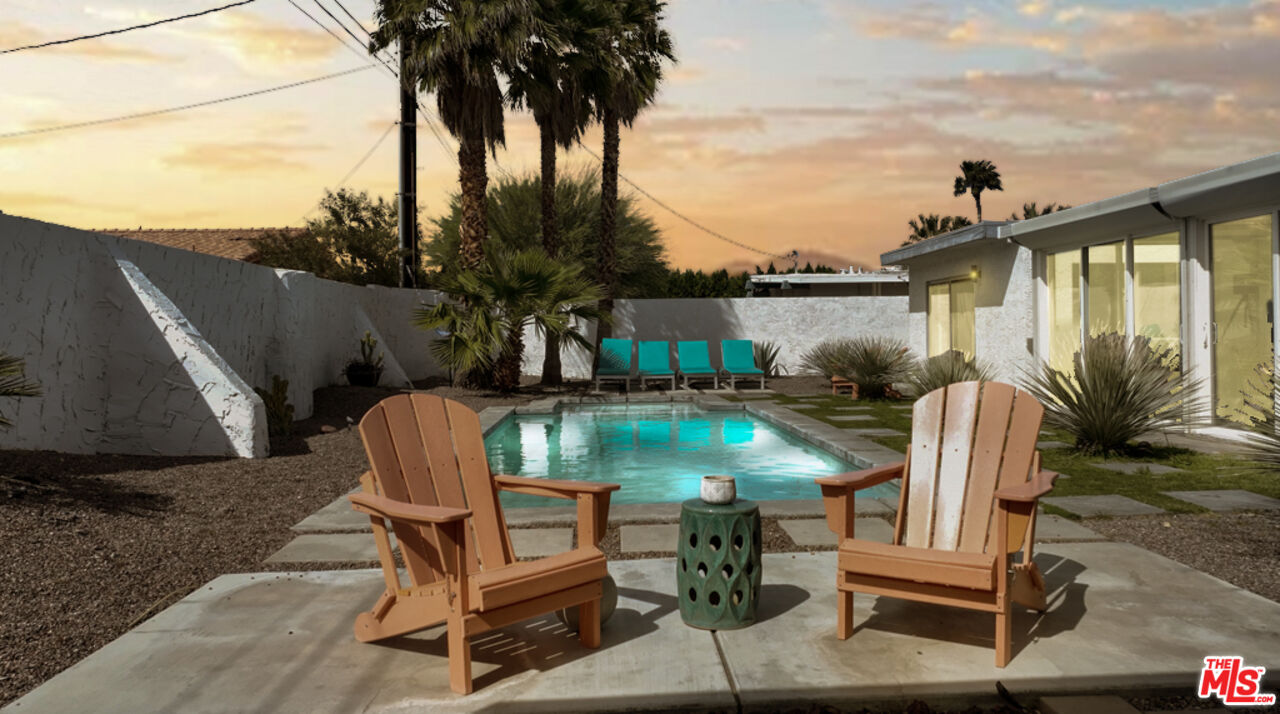 2295 East Nicola Road Palm Springs, CA 92262 - Photo 20 of 23 a view of a backyard with furniture