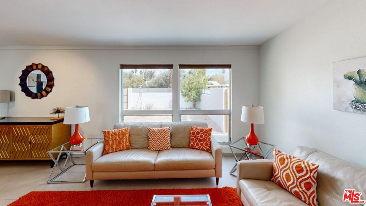 2295 East Nicola Road Palm Springs, CA 92262 - Photo 4 of 23 a living room with furniture and a window
