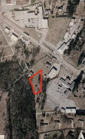 an aerial view of residential house with outdoor space