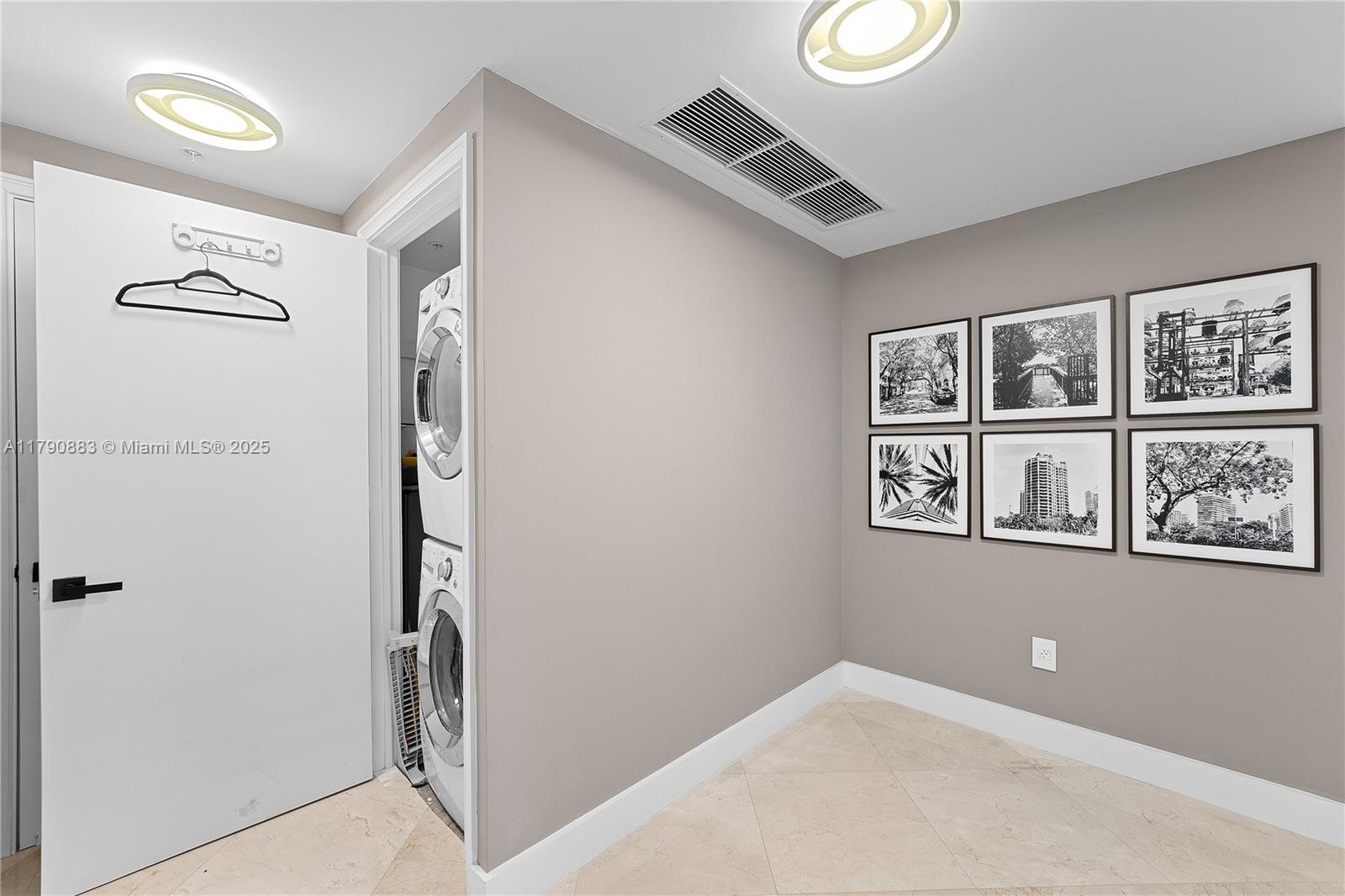 3400 Southwest 27th Avenue, Unit 201 Miami, FL 33133 - Photo 12 of 15 a view of a hallway with workspace