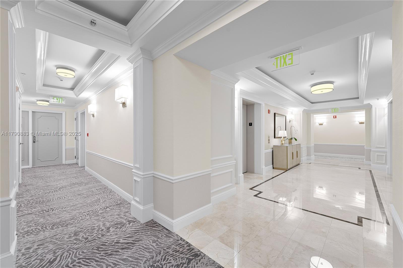 3400 Southwest 27th Avenue, Unit 201 Miami, FL 33133 - Photo 13 of 15 a view of a hallway view with wooden floor and dining room