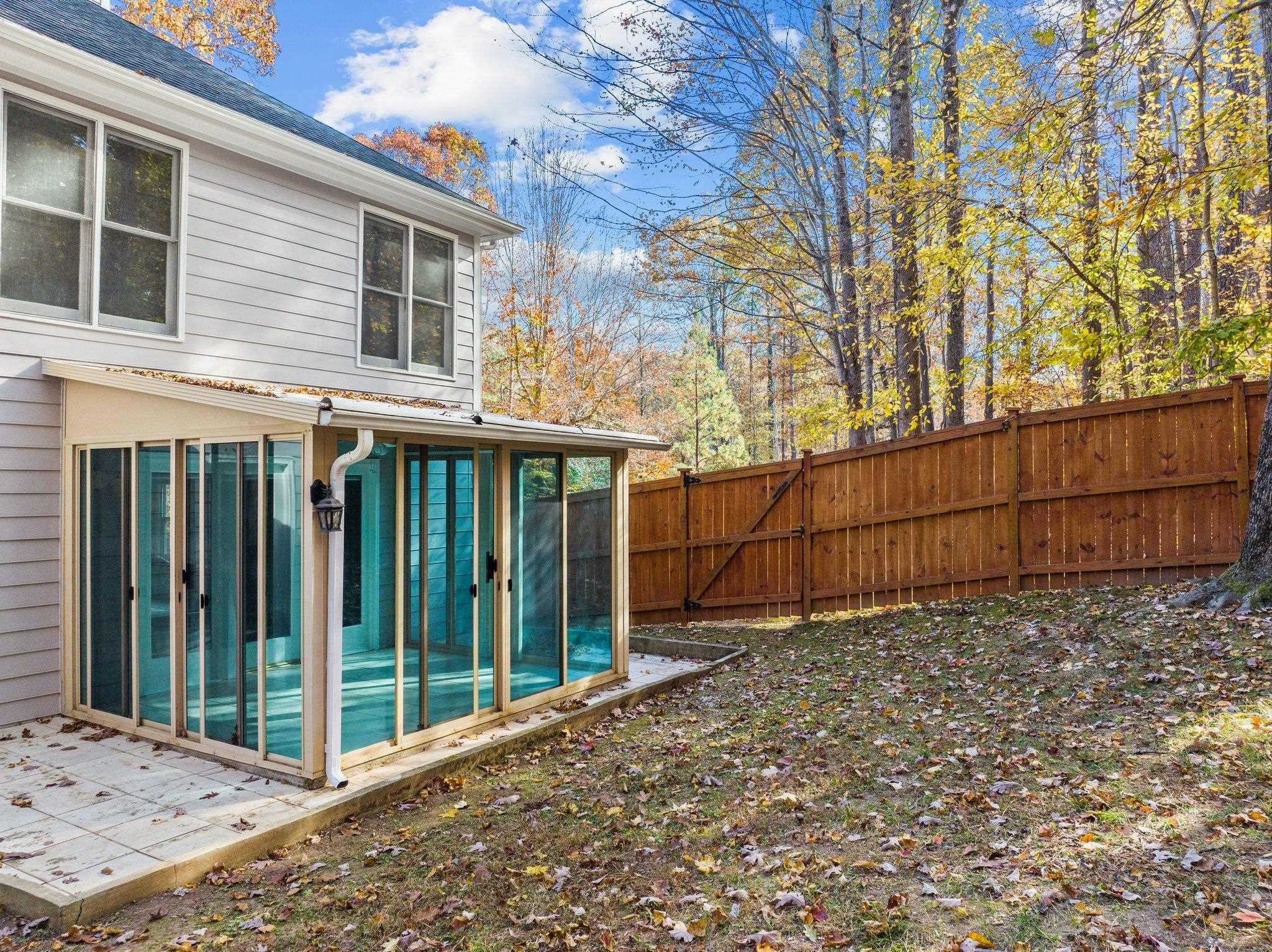 5808 Glenfiddich Way Raleigh, NC 27613 - Photo 13 of 64 a view of a backyard