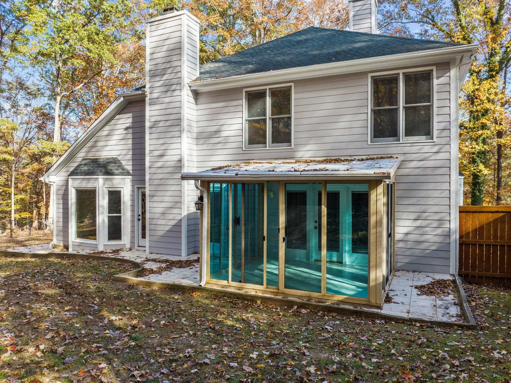 5808 Glenfiddich Way Raleigh, NC 27613 - Photo 14 of 64 a view of a house with a garden