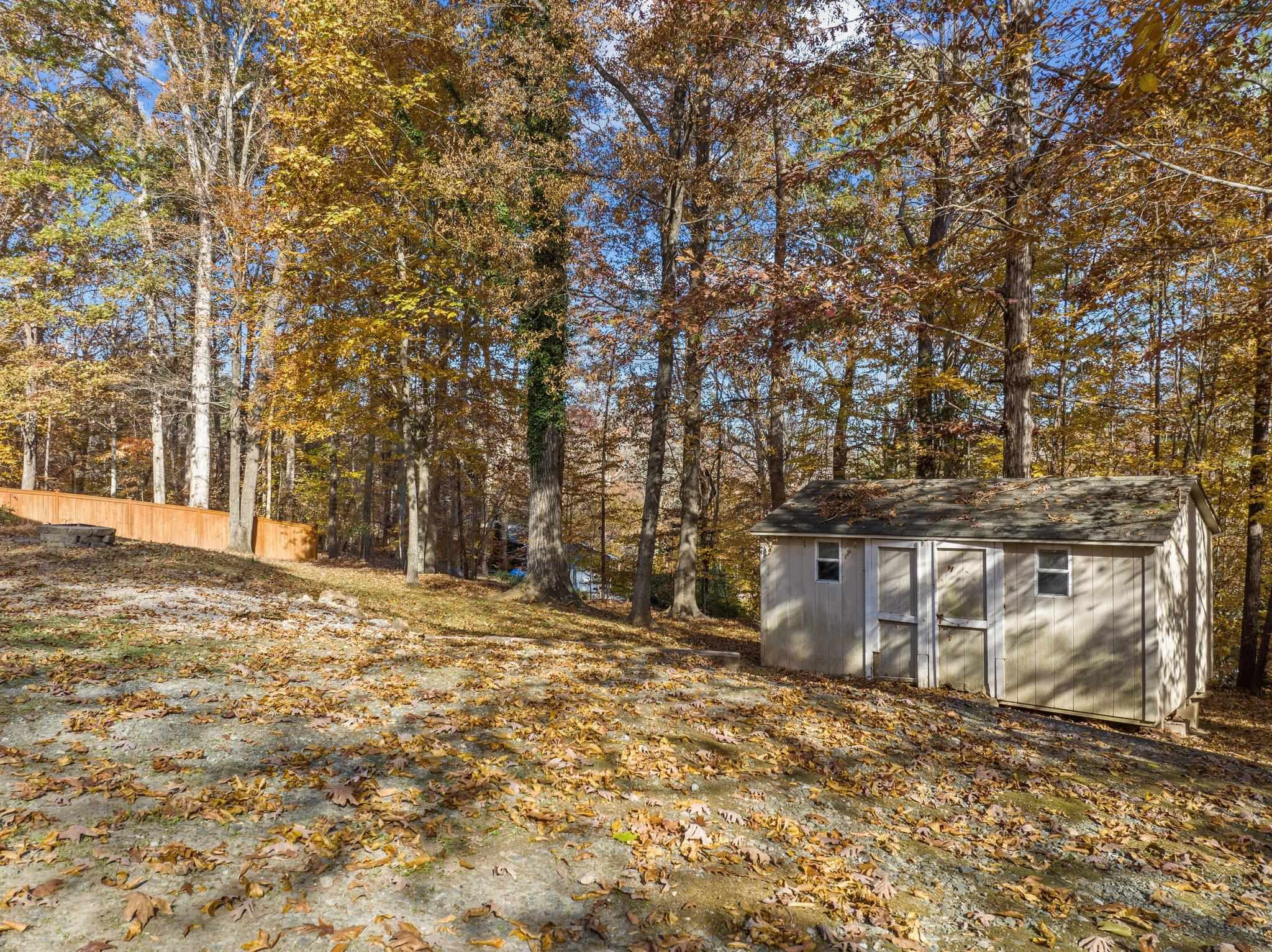 5808 Glenfiddich Way Raleigh, NC 27613 - Photo 15 of 64 a view of a yard with a tree