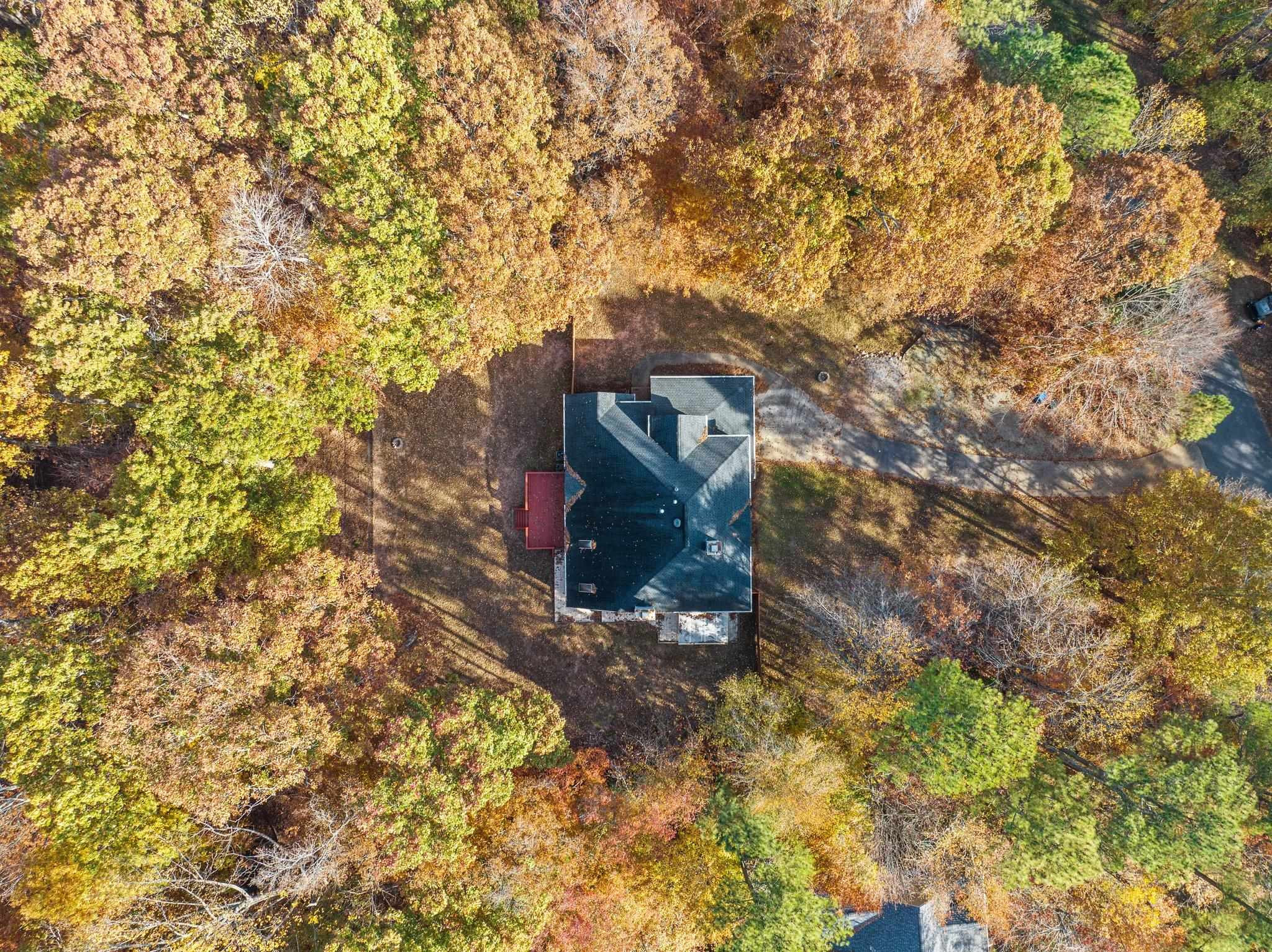 5808 Glenfiddich Way Raleigh, NC 27613 - Photo 20 of 64 a view of a yard with plants and trees