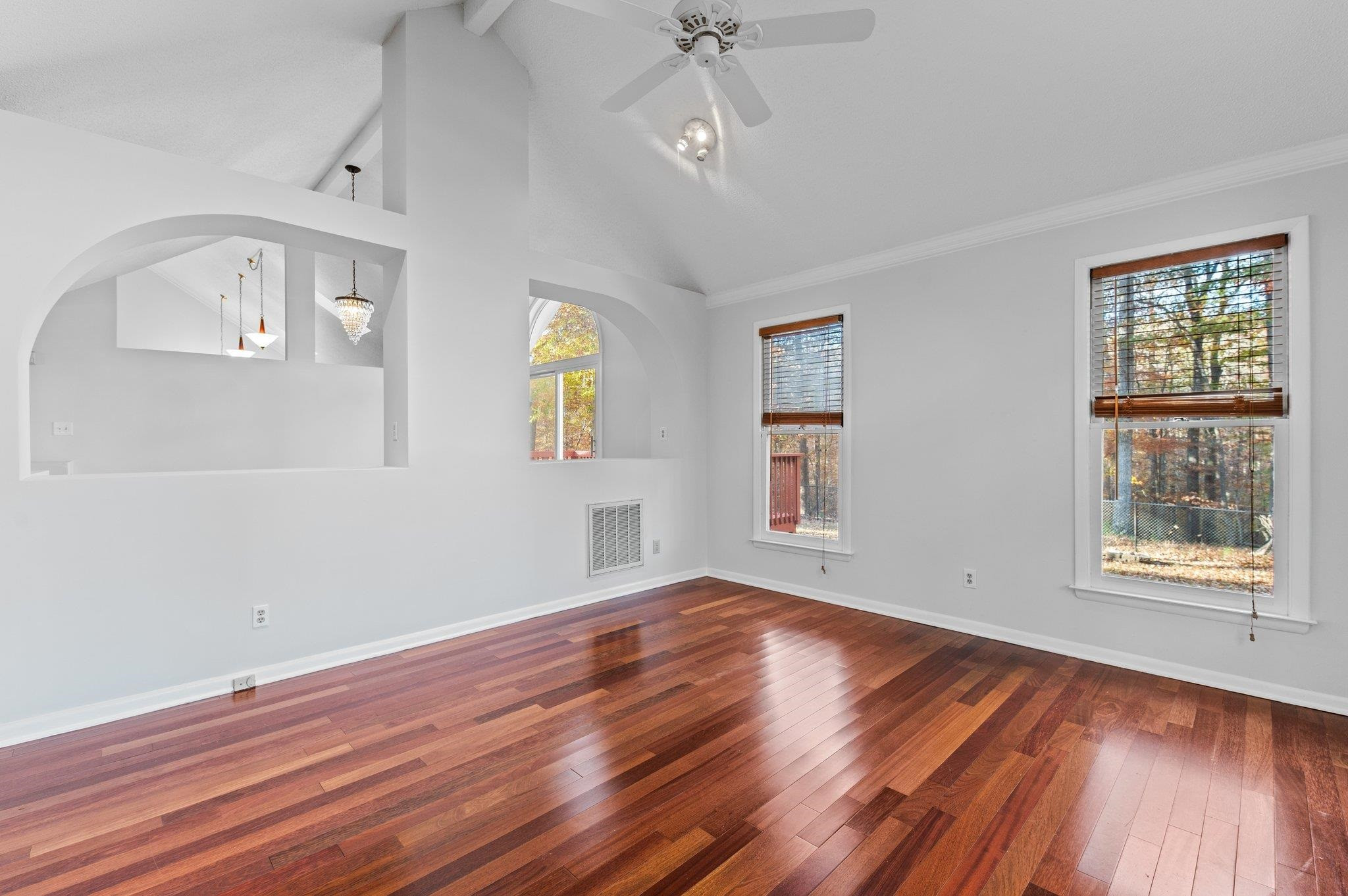 5808 Glenfiddich Way Raleigh, NC 27613 - Photo 28 of 64 wooden floor in an empty room with a window