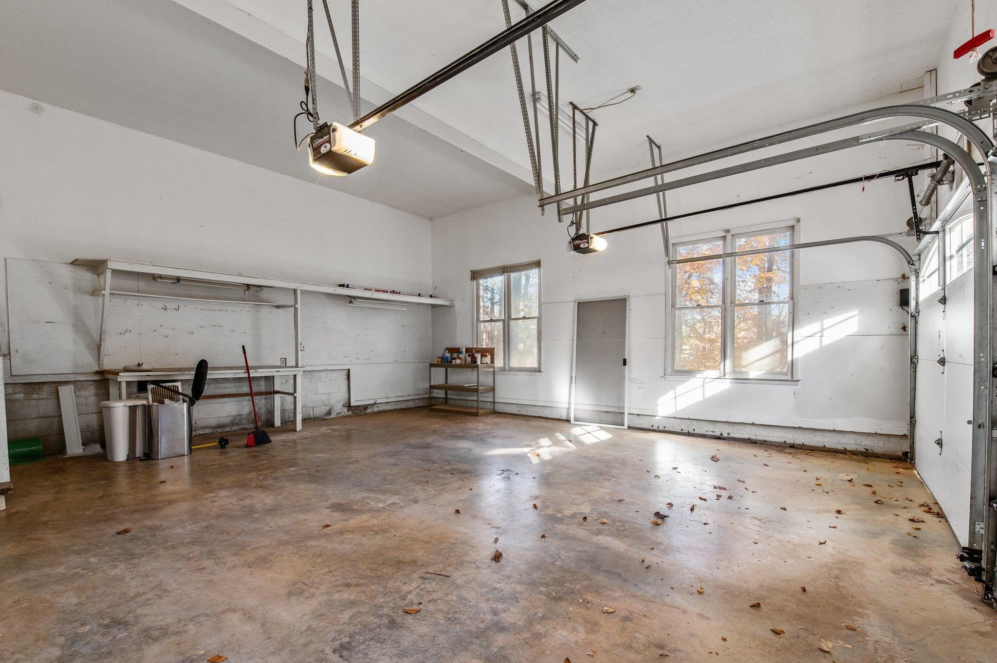 5808 Glenfiddich Way Raleigh, NC 27613 - Photo 34 of 64 a view of a livingroom with furniture and chandelier