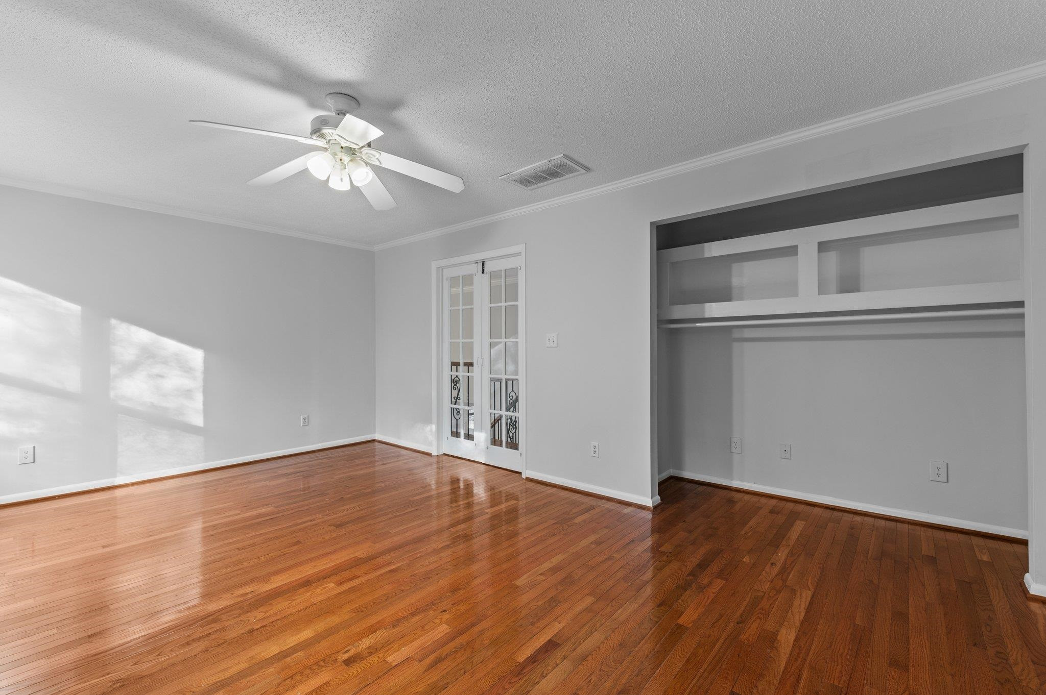 5808 Glenfiddich Way Raleigh, NC 27613 - Photo 58 of 64 a view of an empty room with wooden floor and a window