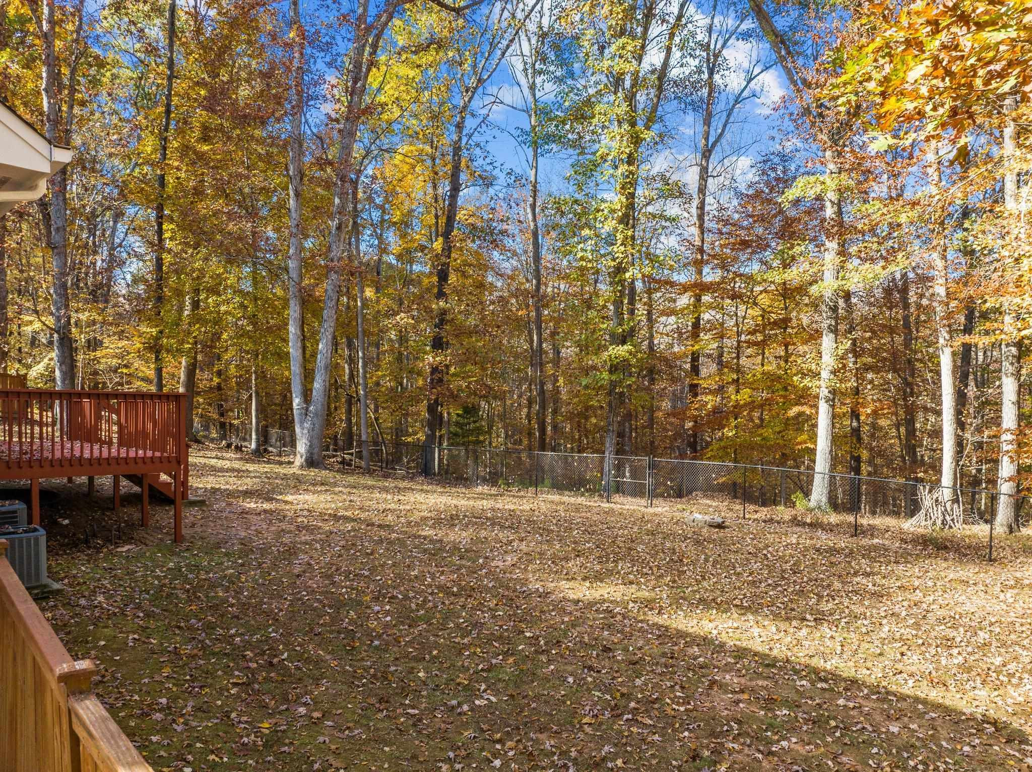 5808 Glenfiddich Way Raleigh, NC 27613 - Photo 6 of 64 a backyard of a house with barbeque oven