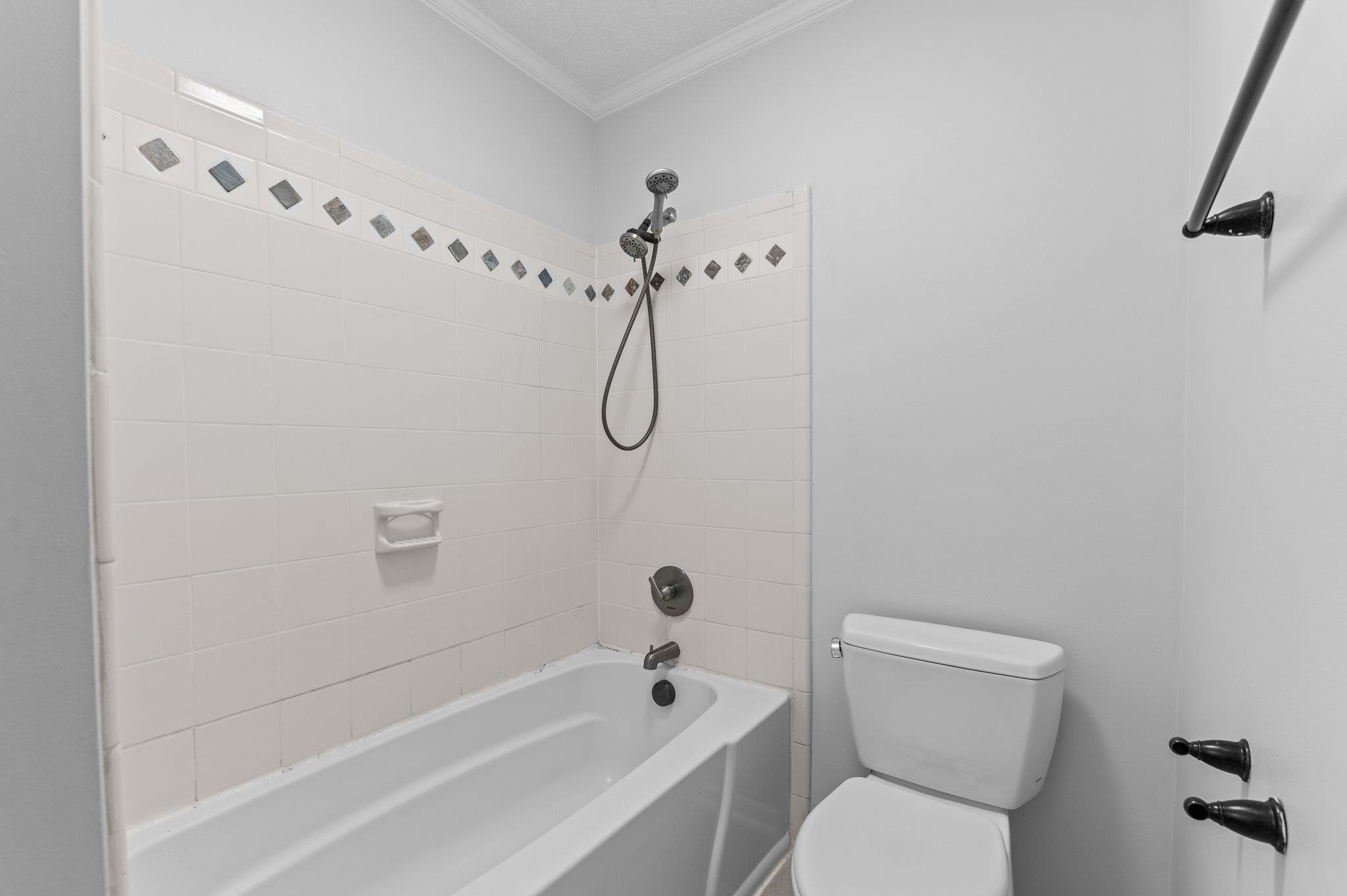 5808 Glenfiddich Way Raleigh, NC 27613 - Photo 64 of 64 a bathroom with a toilet sink and shower