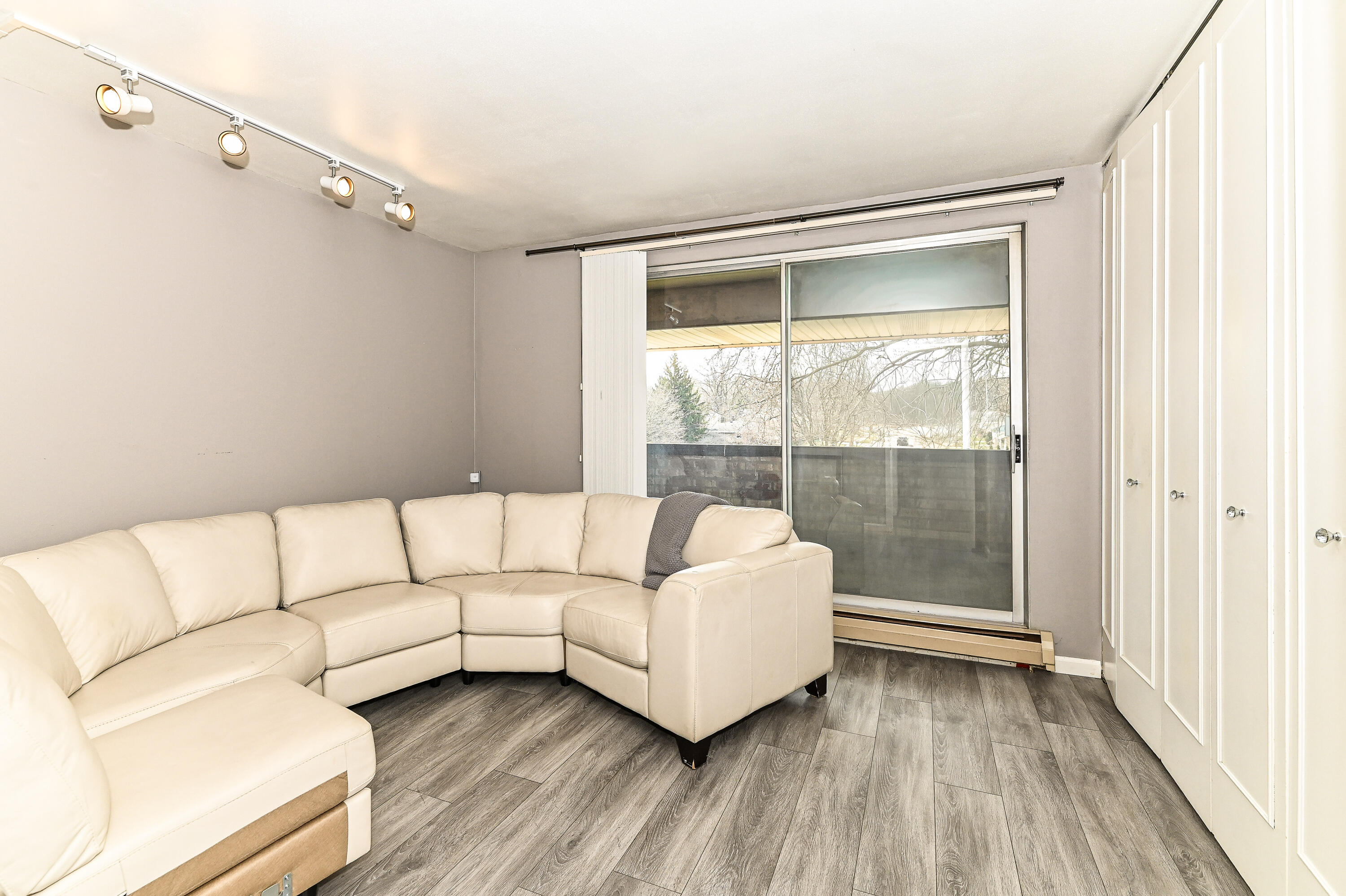 11926 West Mill Road, Unit 4 Milwaukee, WI 53225 - Photo 11 of 34 Br 2 Has large closet and access to balcony